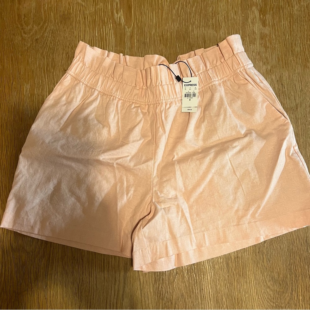 Express Paperbag Shorts. Size large. New with tags. Light pink. Linen material.